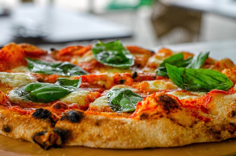 Classic Margherita coal-fired pizza with fresh mozzarella and basil